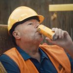 Fans left baffled as five-time world darts champion spotted in disguise on chocolate milk advert with no explanation