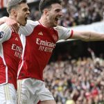 Arsenal sink Bournemouth to stay top of Premier League table